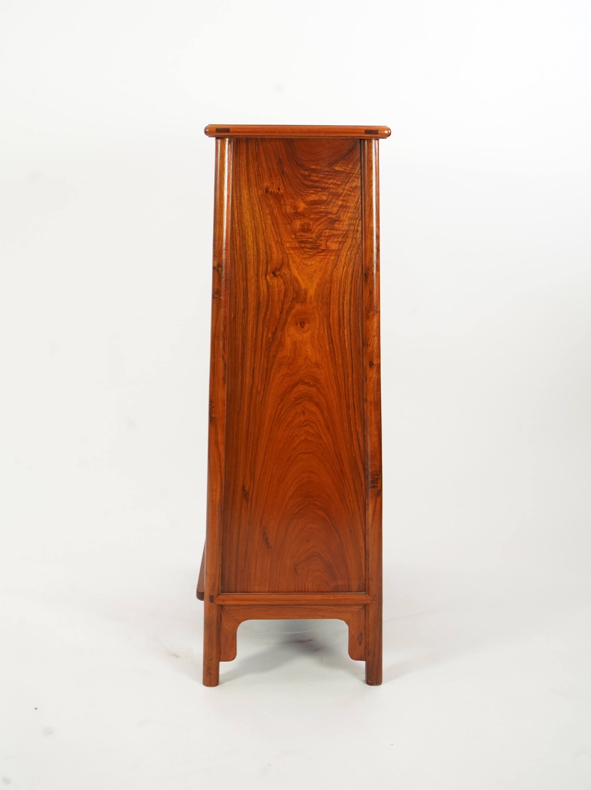 A Chinese huanghuali round-corner cabinet, yuanjiaogui, 19th/20th century